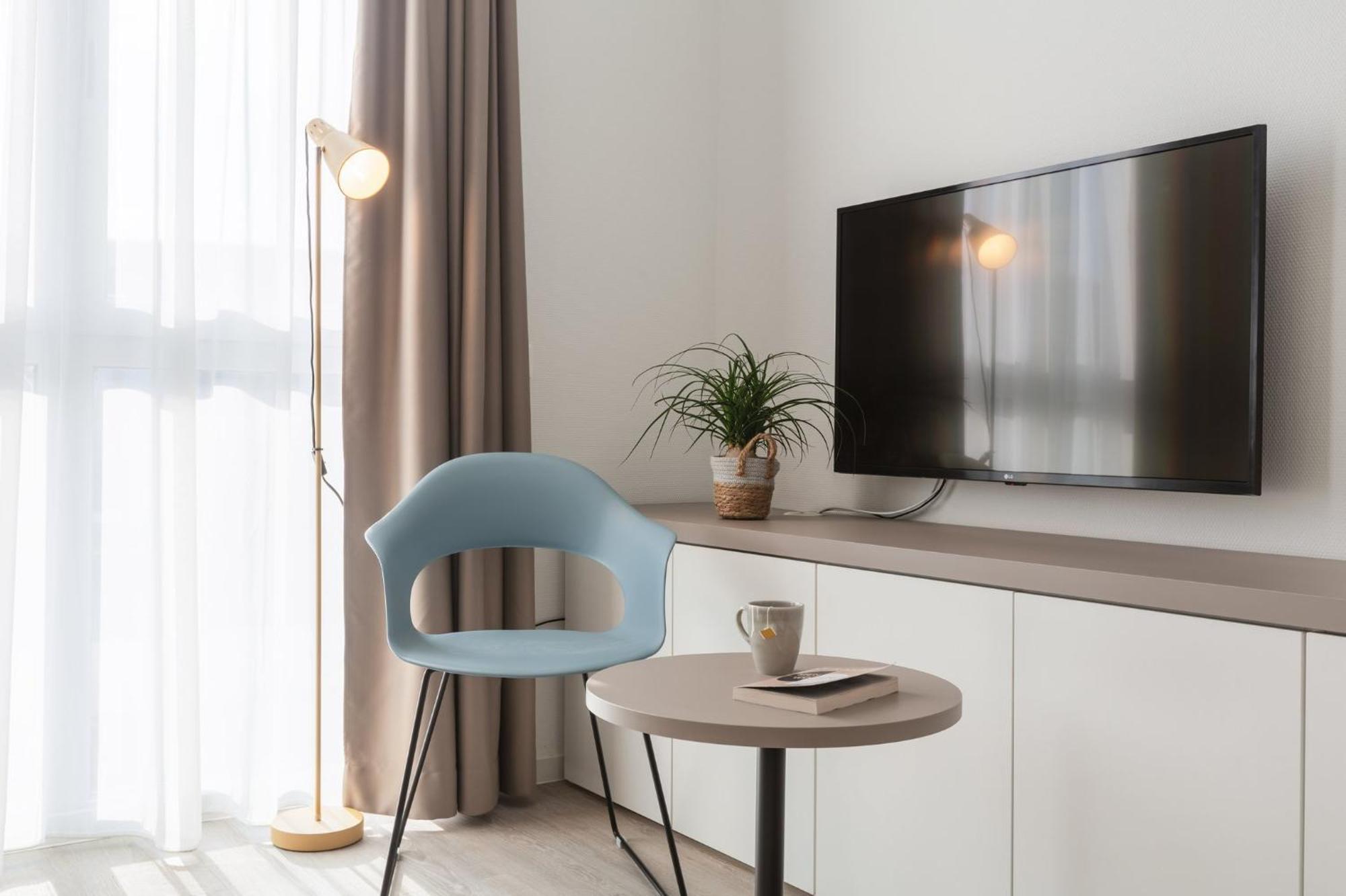 Studio mit Queensize-Bett und Kochnische